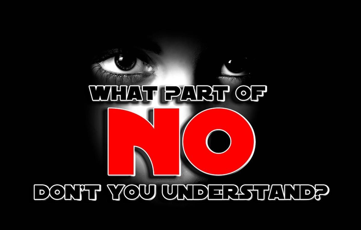 What part of no do you not understand? written over a person's black and white photo